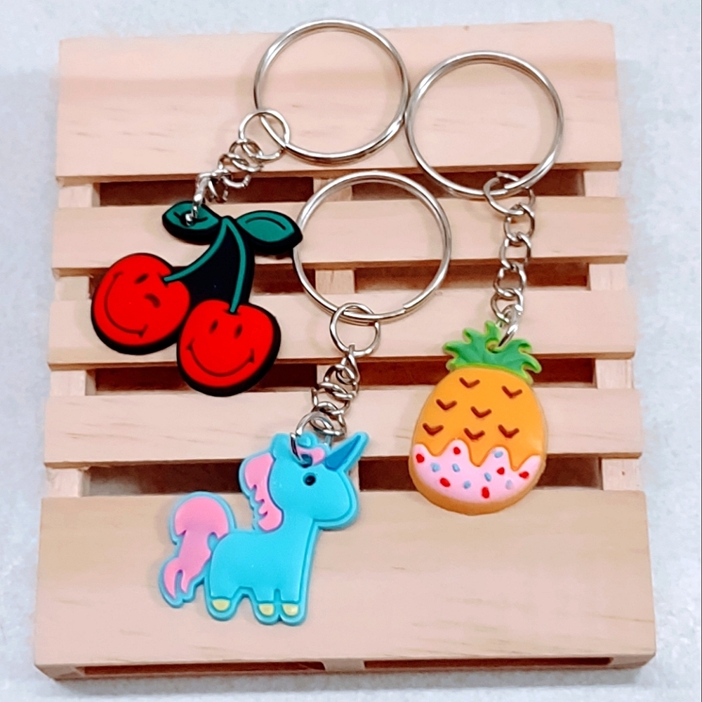 KIDCORE LOT OF 3 KEYCHAINS CHERRY ICED PINEAPPLE AND UNICORN - Picture 1 of 4